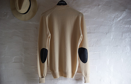 Littler's Cashmere Sweater leather patch on hanger